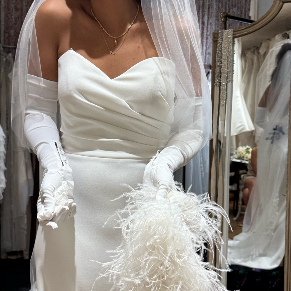 Yvonne Le Fleur Elegant White Wedding Dress with Ostrich Feather Detail - Picture 4 of 13